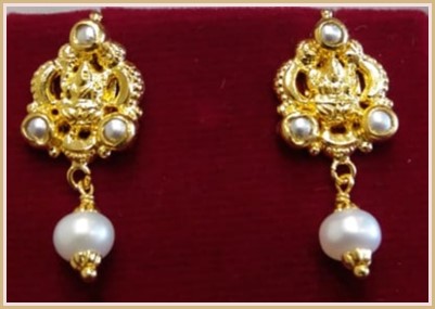 Lakshmi Devi With White Pearls earrings